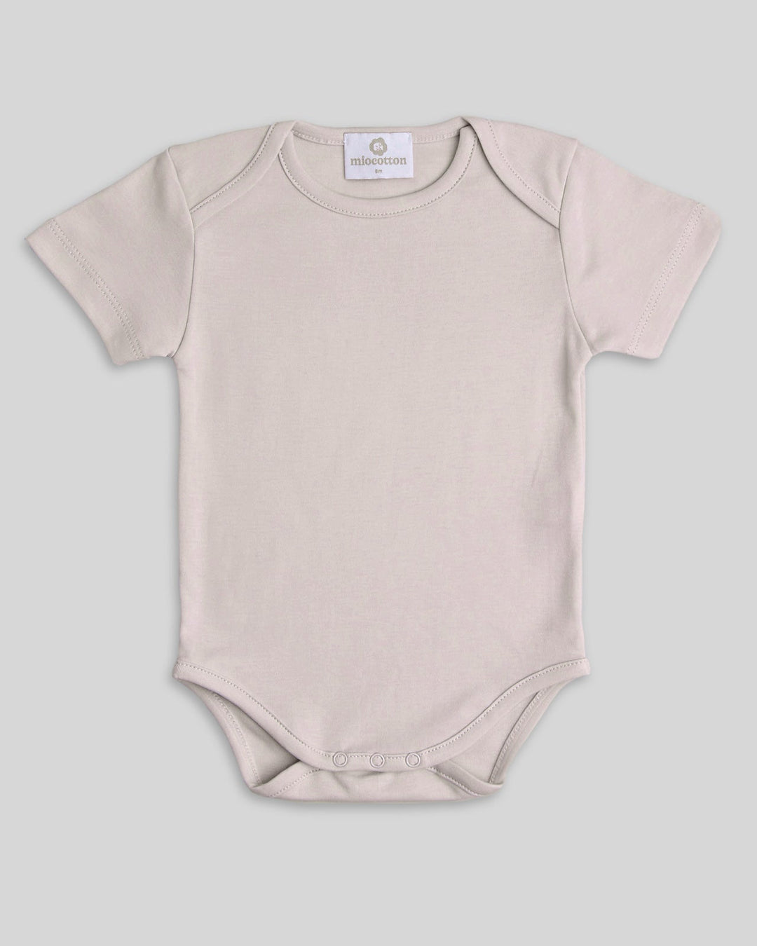 Body para bebés en color nude, práctico y elegante.