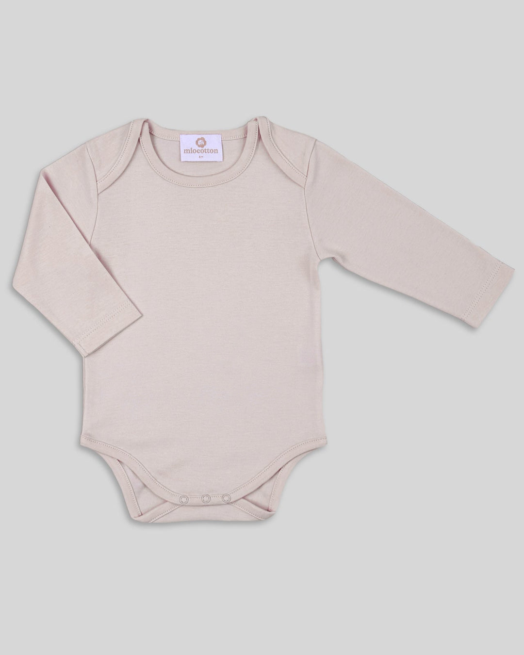 Body para bebés en color nude, práctico y elegante.