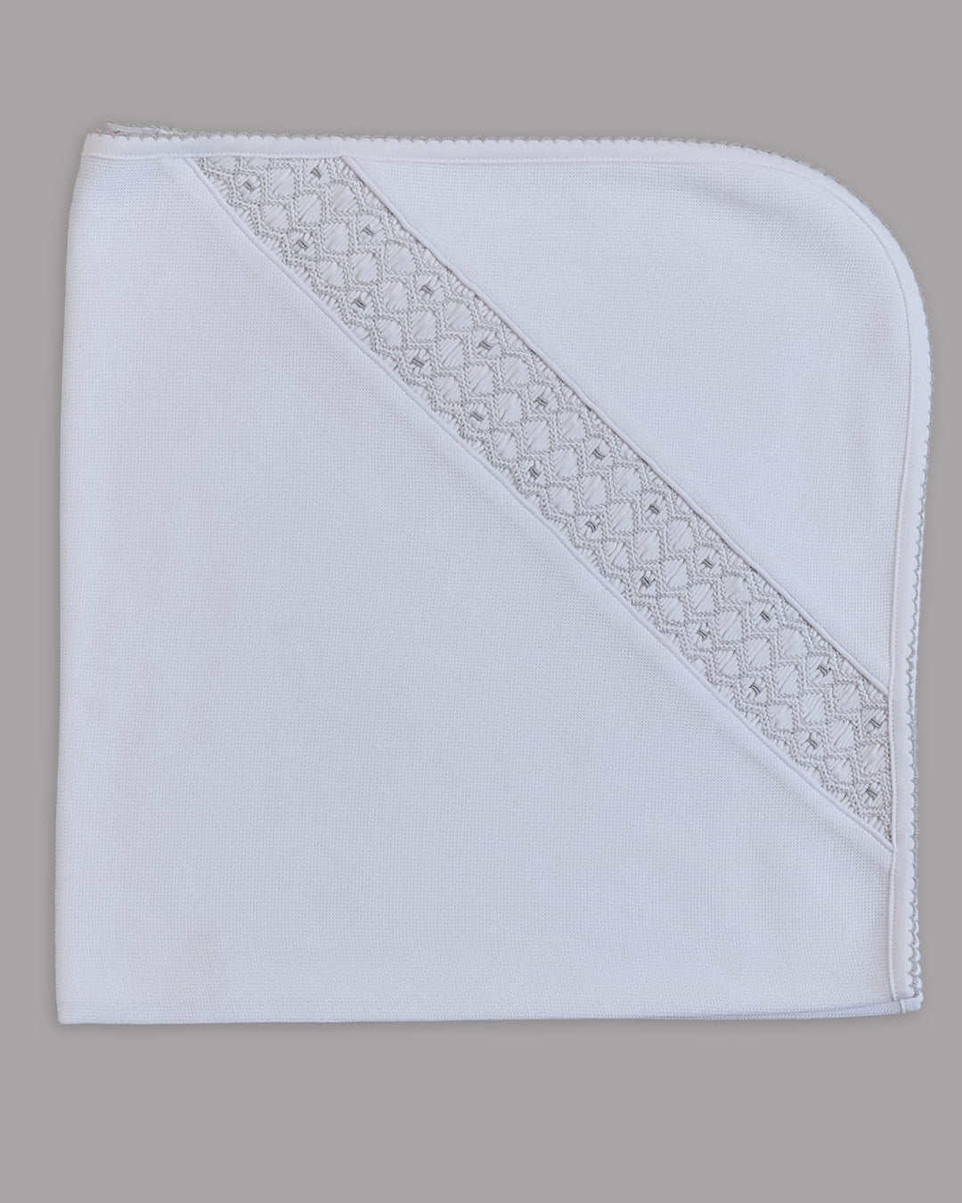 Manta Tarik para niño color blanco con bordado punto smock