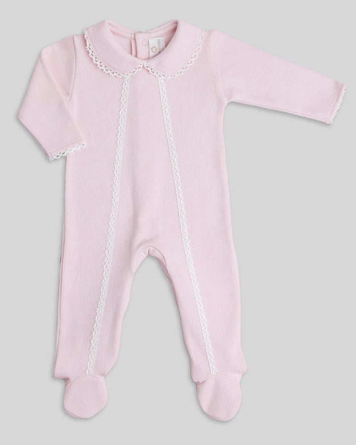 Enterizo rosado para bebes, con detalles blancos, ideal para cualquier ocasion