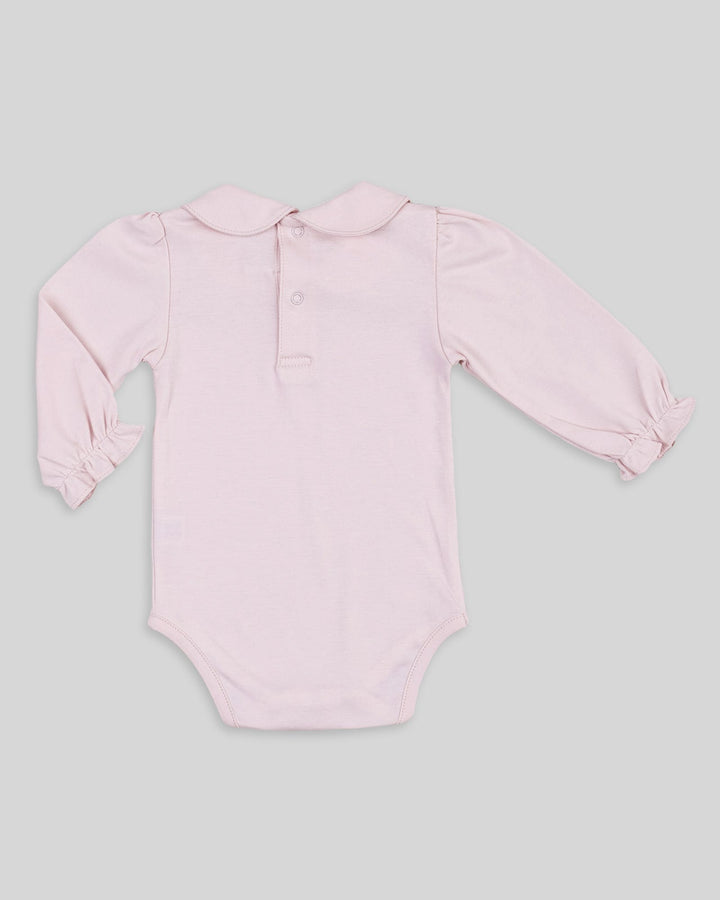Body con cuello para bebés en color rosado, práctico y elegante.