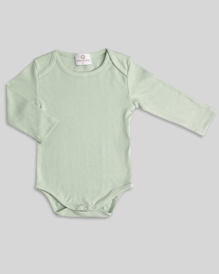Body para bebés en color pistachio, práctico y elegante.
