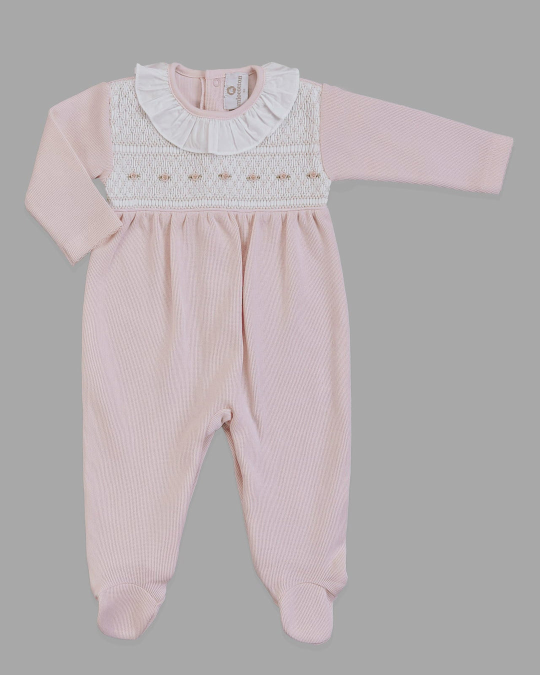 Enterizo rosado para bebé, elegante y cómodo para momentos especiales o el día a día.