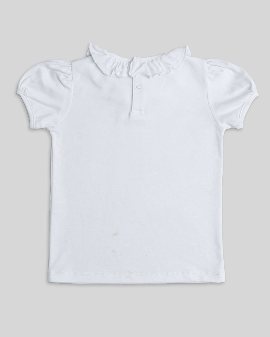 Polo para bebe o niñaen color blanco, comodo y suave, ideal para el uso diario.