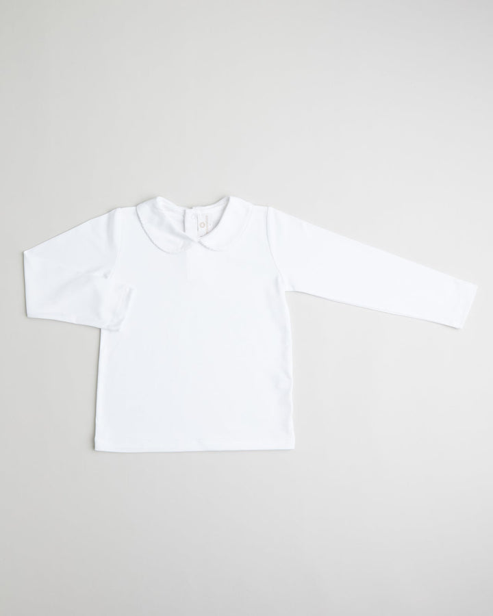 Polo blanco con picoeta Blanco para niñas, comodo y con un diseño clasico ideal para el dia a dia.