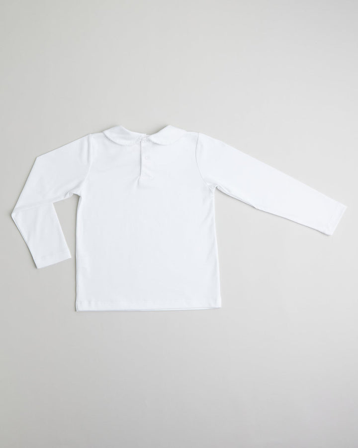 Polo blanco con picoeta Blanco para niñas, comodo y con un diseño clasico ideal para el dia a dia.