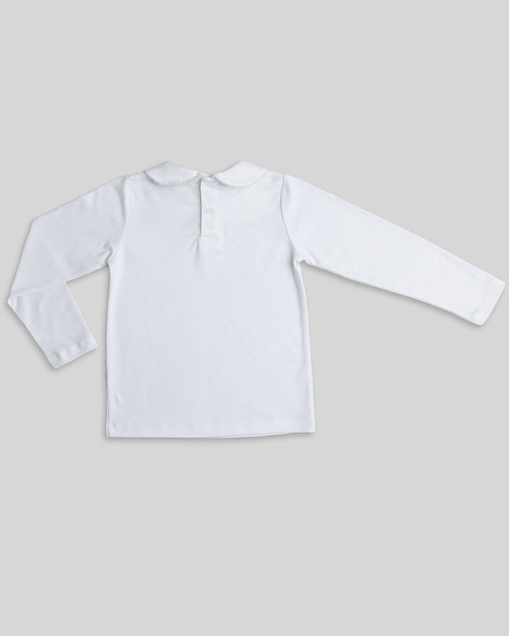 Polo blanco con picoeta rosada para niñas, detalle sutil y encantador para un estilo tierno.
