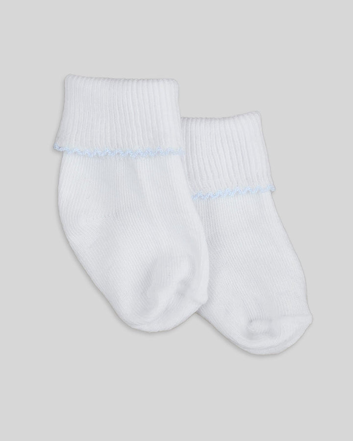 Medias antideslizantes para bebe, disenadas para prevenir caidas y proporcionar estabilidad.