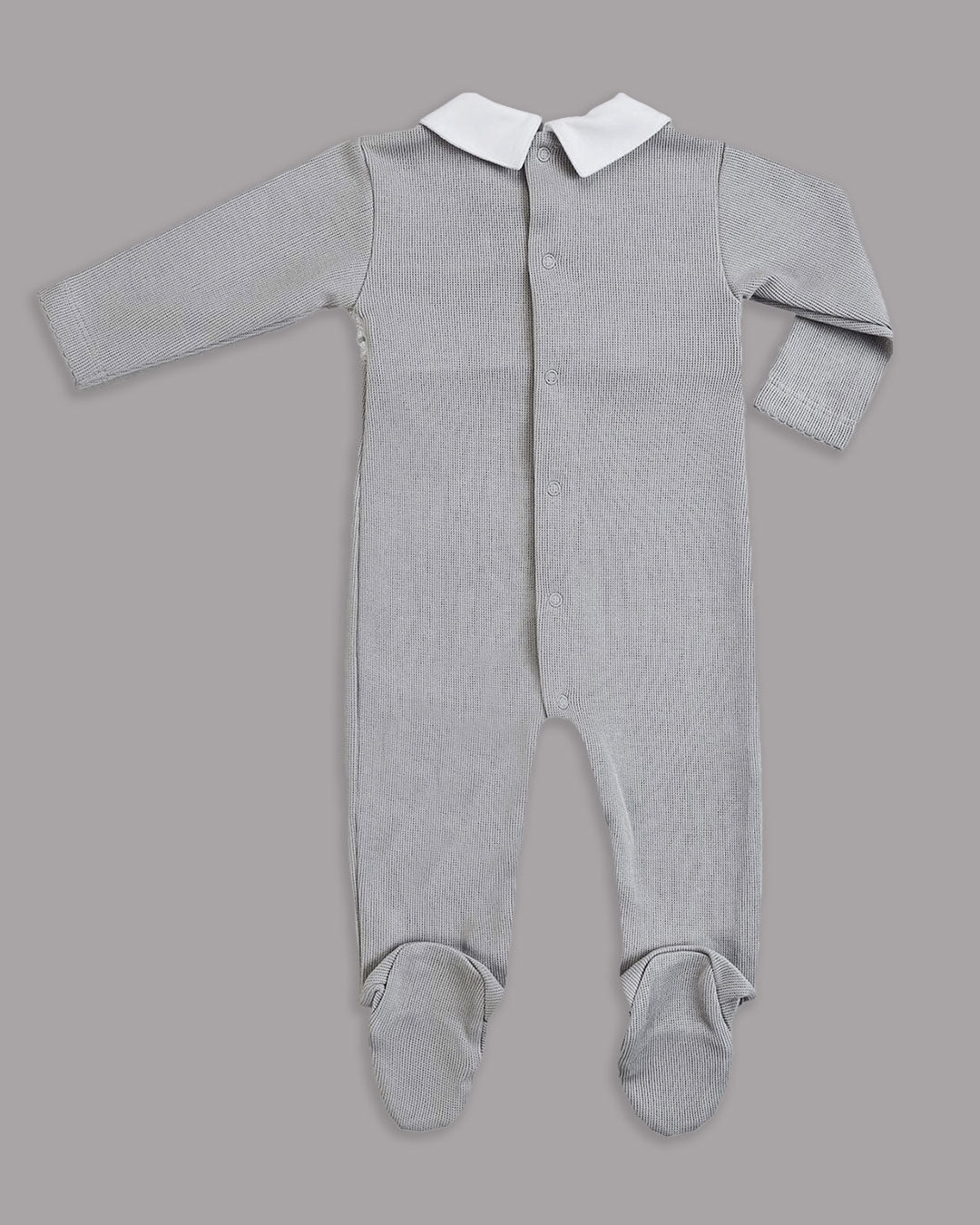 Enterizo gris con blanco para bebé, práctico y elegante para toda ocasión.