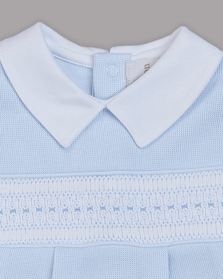 Enterizo corto Alessi para bebes en color celeste con bordado punto smock 