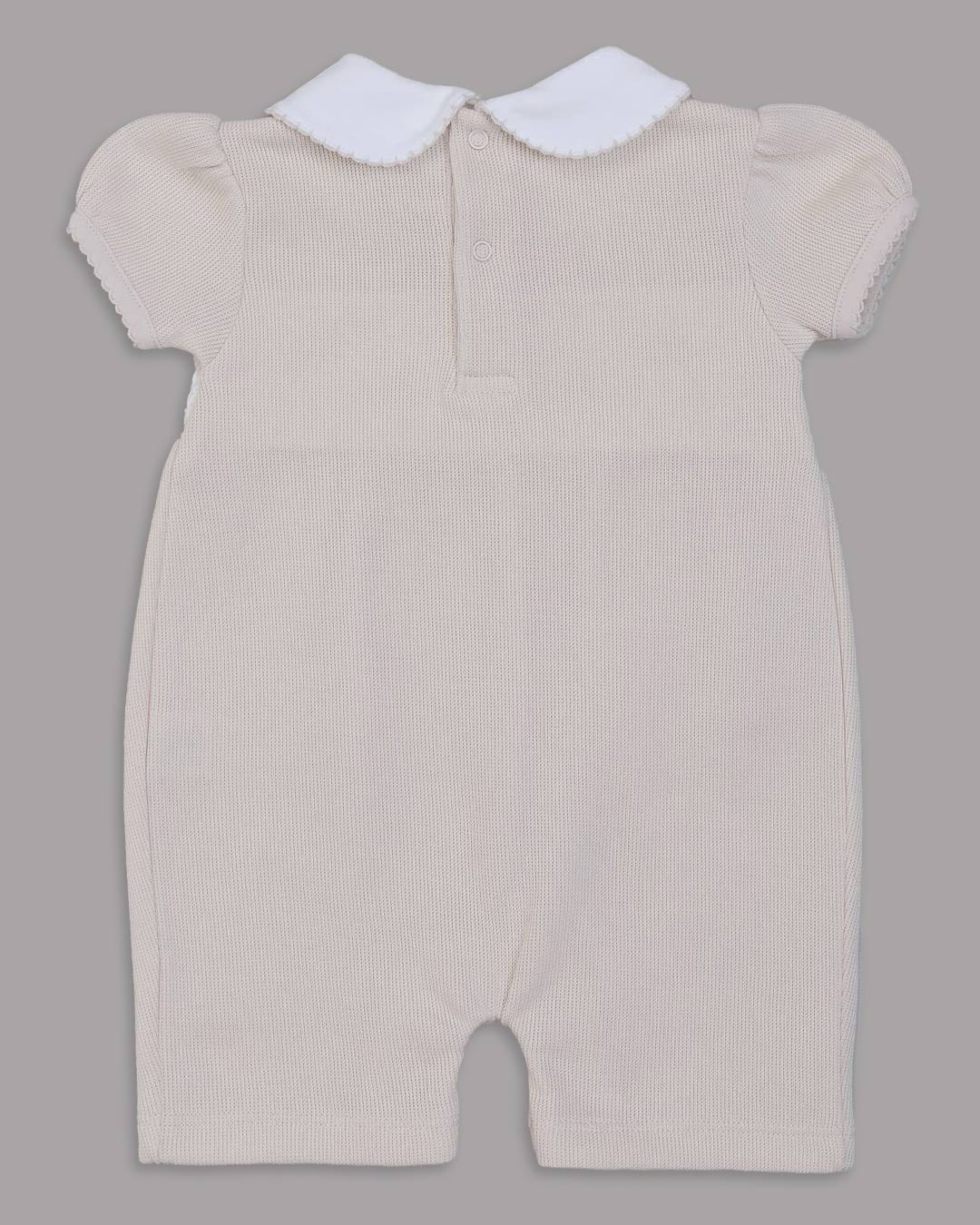 Enterizo corto Zuzzel para bebes en color nude con bordado punto smock 
