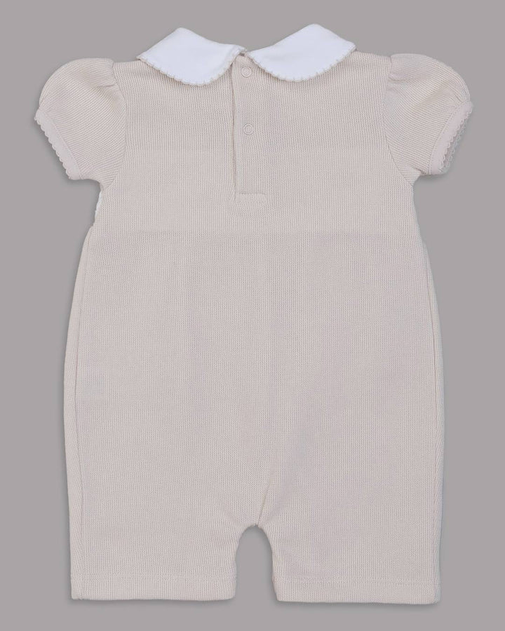 Enterizo corto Zuzzel para bebes en color nude con bordado punto smock 