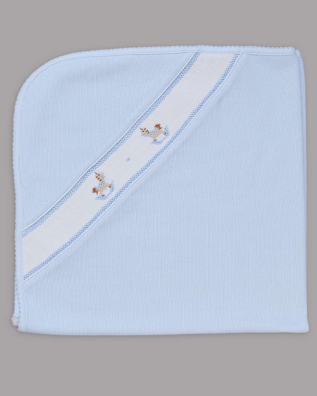 Manta Pony para niño color celeste con bordado punto smock
