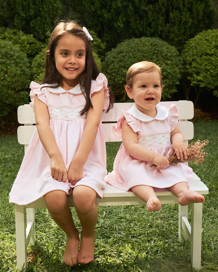 Vestido Emma para niña en color rosado con bordado punto smock
